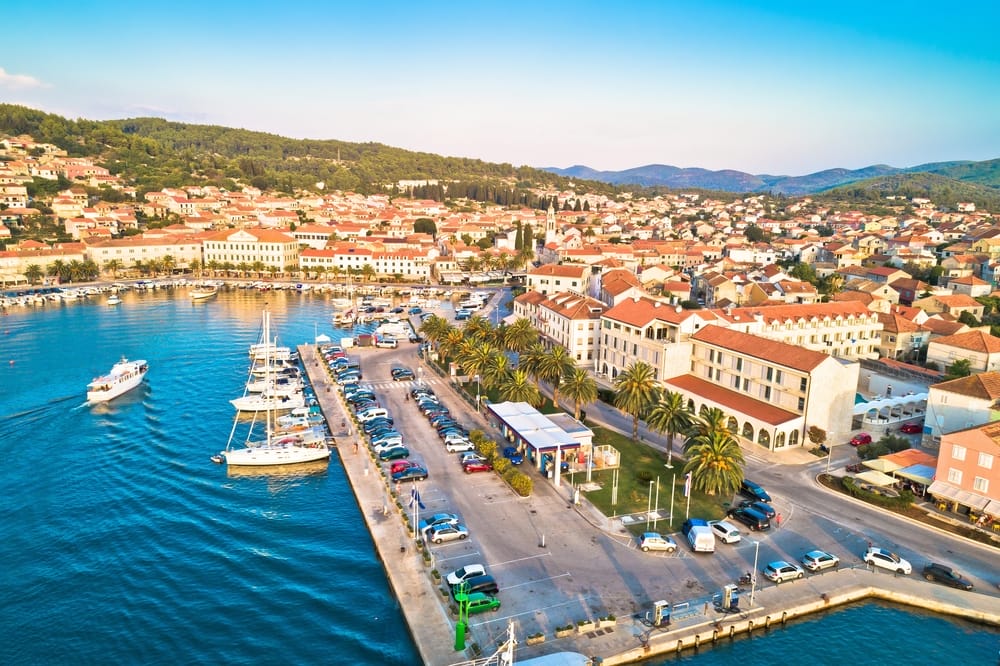 Town of Vela Luka on Korcula island waterfront aerial view